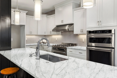 calacatta white quartz countertop in traditional kitchen A5079.jpg